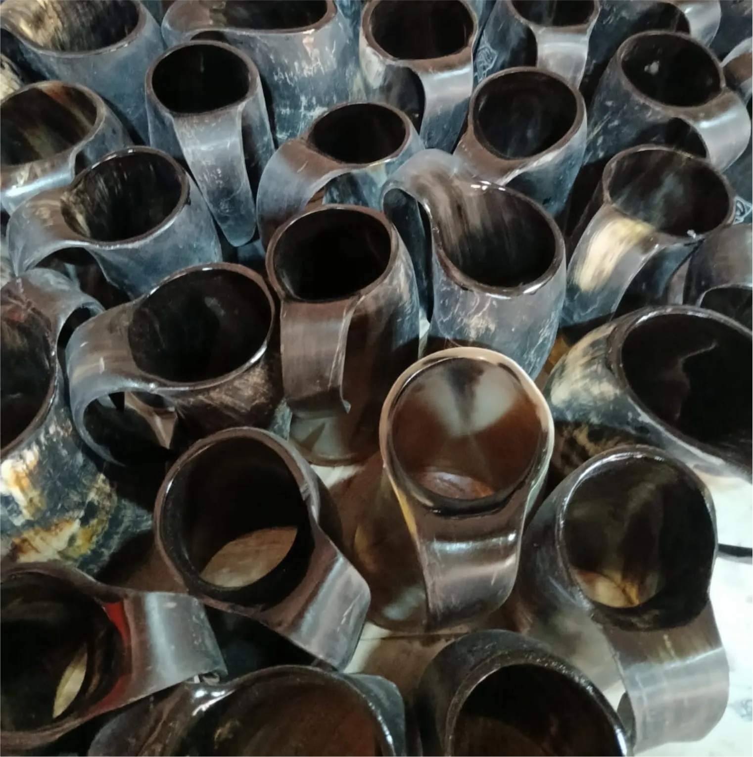 Polished horn mugs awaiting finishing