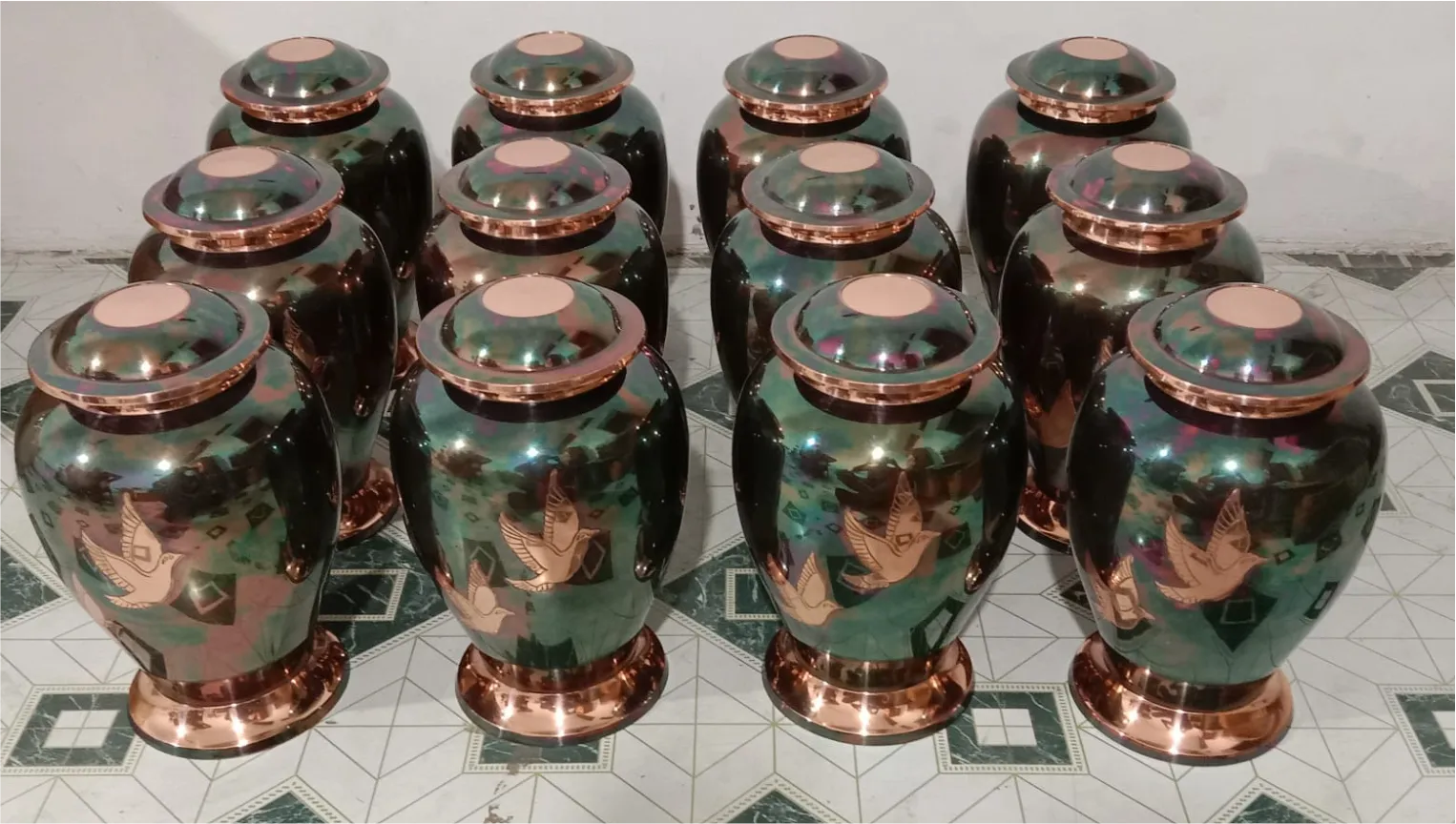 Green and copper enamel cremation urns with lids